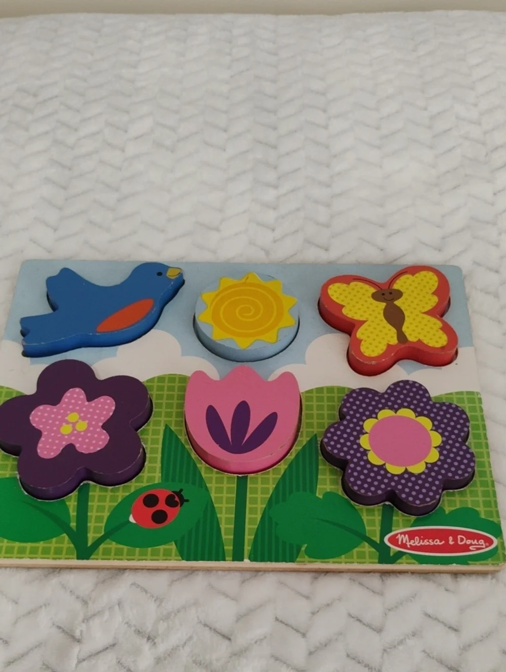 Melissa & Doug Bright Garden Wooden Peg Puzzle - Blue, Yellow, Pink, Purple, Red